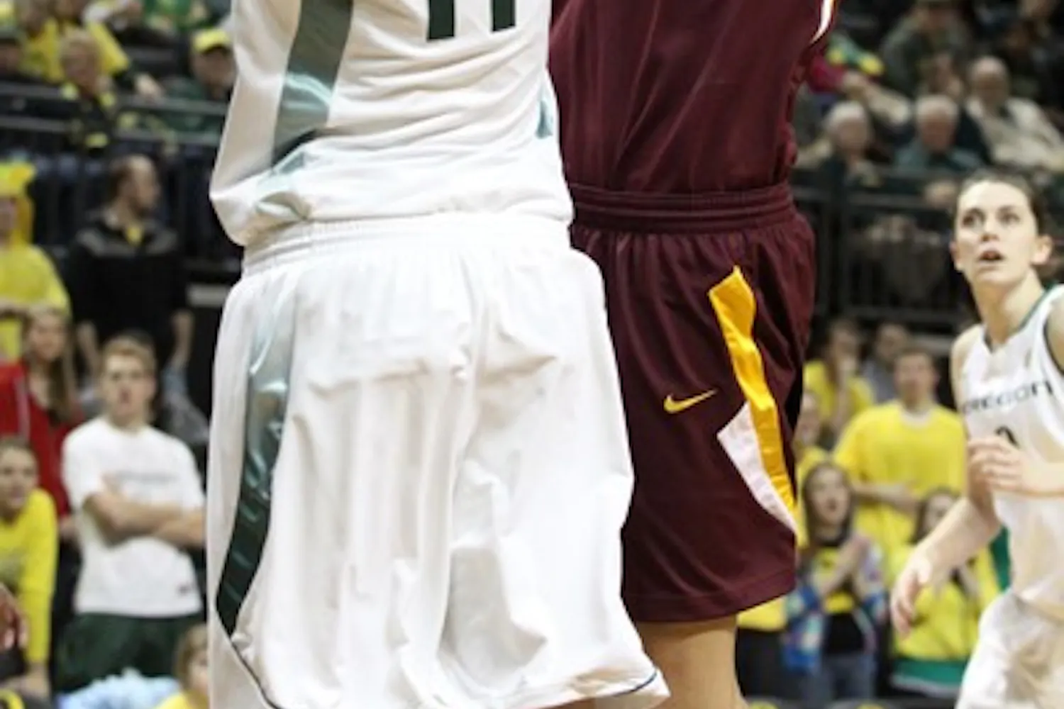 Scoring Barrage: ASU senior Becca Tobin attempts a layup over Oregon junior forward Amanda Johnson during the Sun Devils 75-66 victory over the Ducks in Eugene. Tobin scored 15 points in the game, which was good for third best on the team. (Photo Courtesy of Steve Rodriguez)