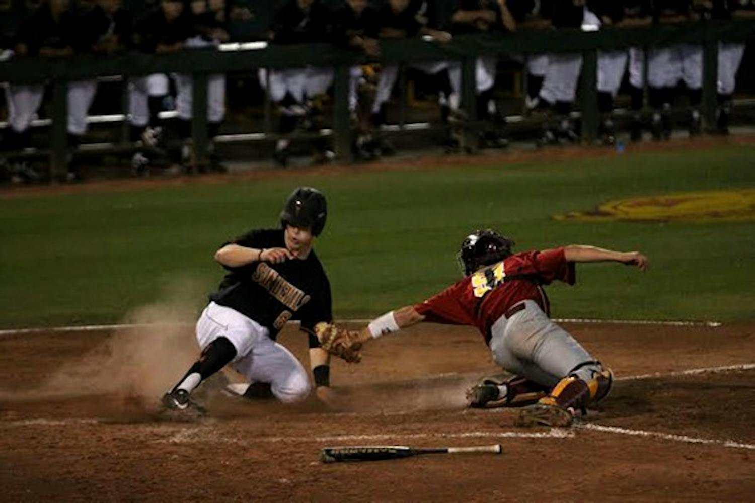 Super performance: ASU sophomore Joey DeMichele rounds third base after hitting a two-run home run during the Sun Devil’s 13-4 dismantling of Arkansas on Sunday. ASU is now headed to the Super Regionals. (Photo by Aaron Lavinsky)