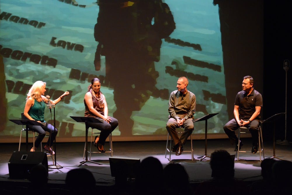 Veteran Karen Pittenger of the U.S. Army tells her story to the panel and guests inside the Lyceum Theatre in Tempe on Nov. 13, 2014. Pittenger went into what it was like to be a woman in the Army. (Photo by Jonathan Williams)