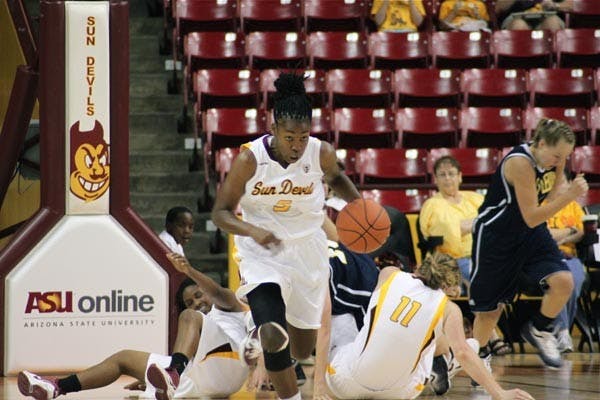 FULL SPEED AHEAD: Sophomore guard Deja Mann brings the ball up court on a breakaway play during ASU's exhibition match with Fort Lewis last weekend. The ASU women's basketball team opened its season over the weekend with wins over NAU and UC Riverside. (Photo by Rosie Gochnour)