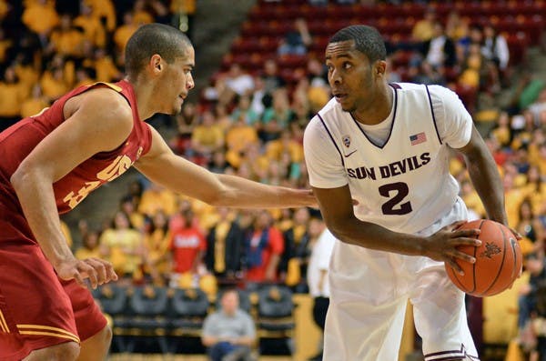 Chris Colvin sizes up a defender in Saturday’s game against USC. Colvin hit a floater with 19 seconds remaining to secure the Sun Devils’ sweep of the Trojans. (Photo by Aaron Lavinsky)