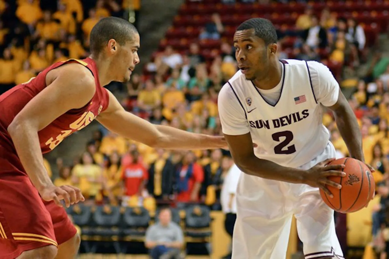 Chris Colvin sizes up a defender in Saturday’s game against USC. Colvin hit a floater with 19 seconds remaining to secure the Sun Devils’ sweep of the Trojans. (Photo by Aaron Lavinsky)