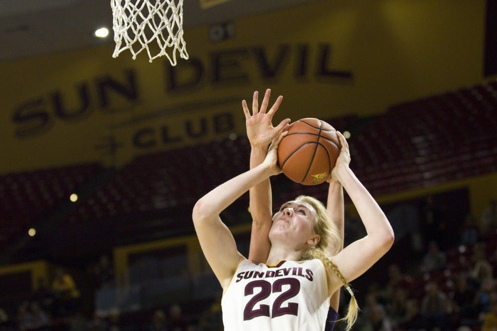 ASU senior center Quinn Dornstauder (22) goes up for a tough shot near the basket during a women's basketball game versus no. 8 Washington in Wells Fargo Arena in Tempe, Arizona on Sunday, Jan. 15, 2017. ASU lost 65-54, putting them at 13-4 on the season.
