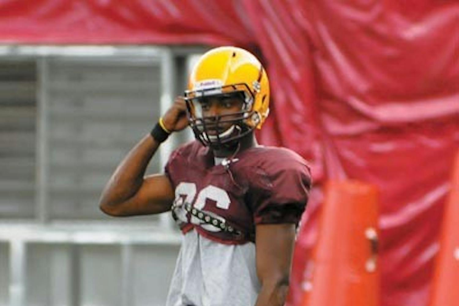 HOMETOWN STAR: Redshirt junior wide receiver T.J. Simpson works out in practice Tuesday. (Photo by Aaron Lavinsky)