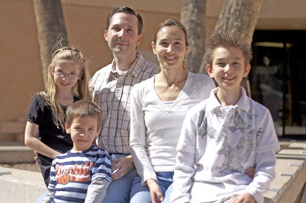 A FAMILY AFFAIR: Chris Bahr is a second year law student who will have to leave his family behind this summer as he studies abroad. (Photo by Scott Stuk)