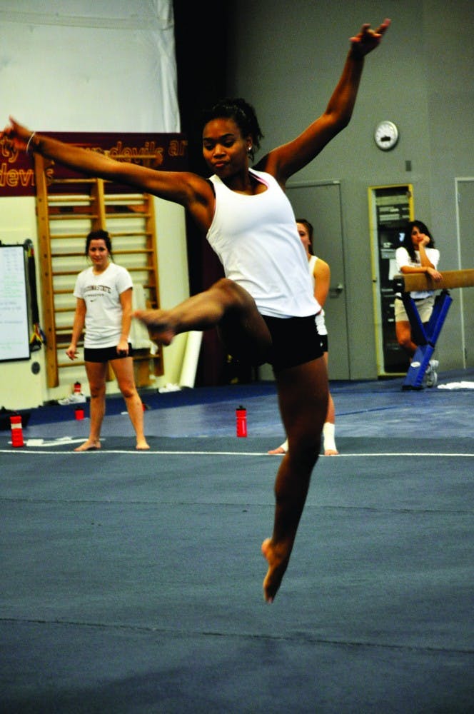 WINTER RIVALRY: ASU sophomore Nickie Johnson practices her floor routine on Thursday. The No. 25 Sun Devils will travel to Tucson on Friday to face off against No. 19 UA. (Photo by Sierra Smith)