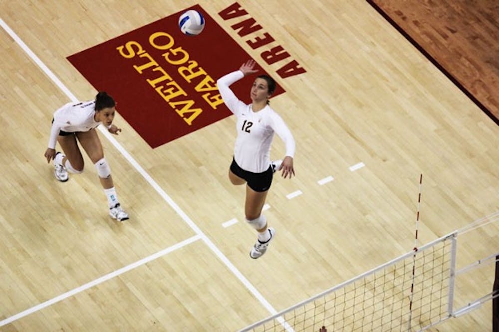 Freshman outside hitter Macey Gardner lifts up to hit the ball during the Sheraton Invitational at Wells Fargo Arena last weekend. (Photo by Kyle Newman)