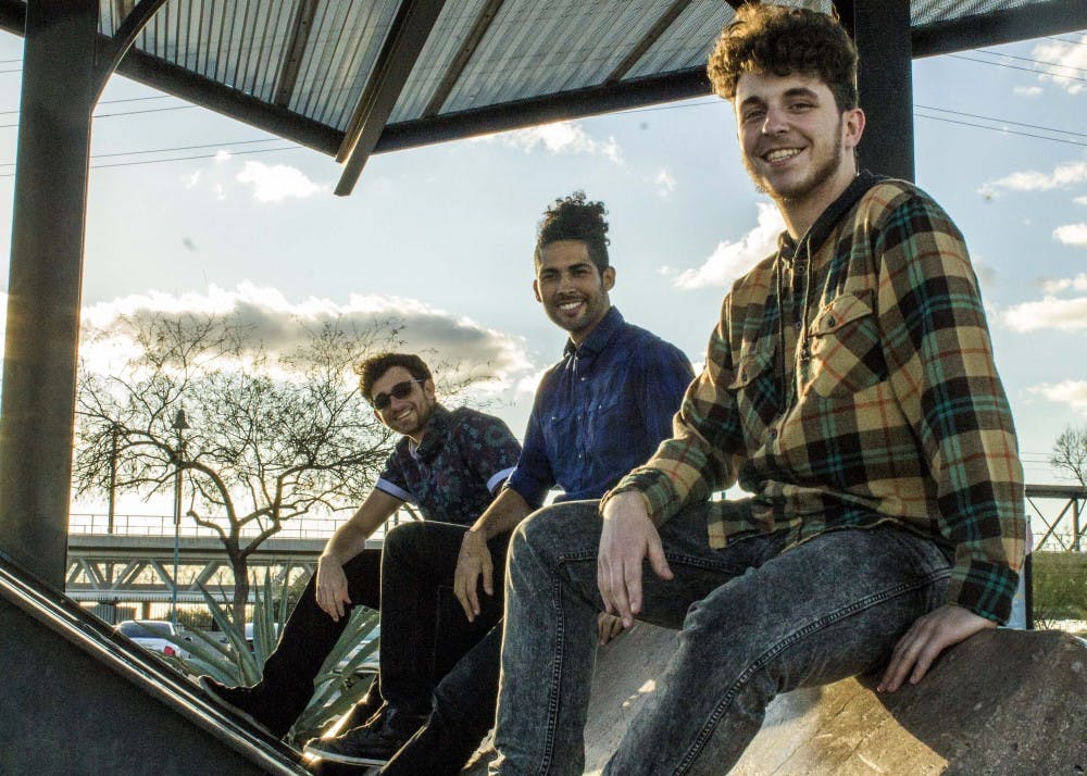 Local band, People Who Could Fly from left to right: Josh Paige, James Mills, and Jacob Paige pose for a portrait at Tempe Beach Park on Tuesday, Feb. 28, 2017
