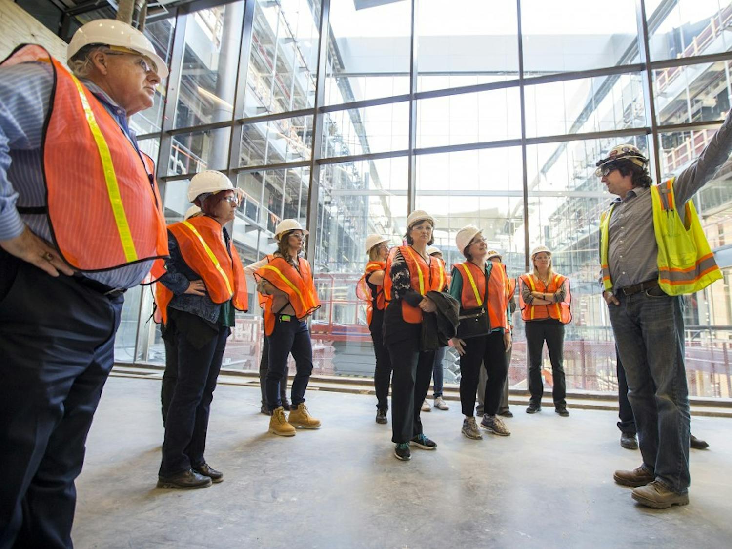 Project Manager Lew Laws, of DPR Construction, gives a tour of the Arizona Center for Law and Society to a group of faculty, alumni and reporters on the ASU Downtown Campus in Phoenix, Arizona, on Wednesday, March 23, 2016. The construction project is set to be finished and turned over to ASU in early June, Laws said. 