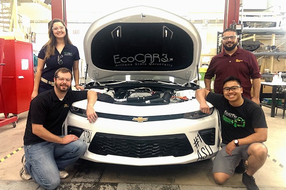 Briana Del Bianco (top left), Mohammed Alzorgan (top right), Josh Carroll (bottom left) and Josh&nbsp;Bounlangsy (bottom right) pose for a portrait with ASU's EcoCar3 Chevrolet Camaro.