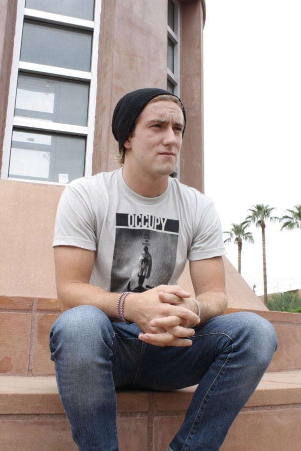 ASU business sophomore Drew Curry talks on Tuesday afternoon about founding his clothing company The Ollin. (Photo by Cameron Tattle)