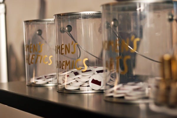 MONEY VOTE: Women voted with chips Tuesday afternoon at the Levi's Curve ID event at the Hassayampa Pavilion in Tempe whether they felt a $10,000 grant should go toward women's athletics, women's academics, or women's arts. (Photo by Michaela Mader)