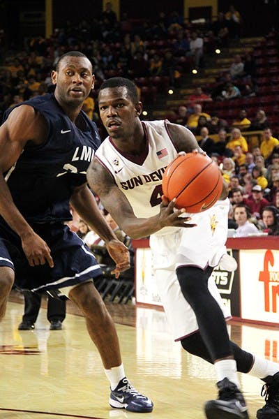Junior guard Gerry Blakes drives to the basket during ASU's 68-44 win over Loyola Marymount on Thursday, Nov. 20, 2014 at Wells Fargo Arena.