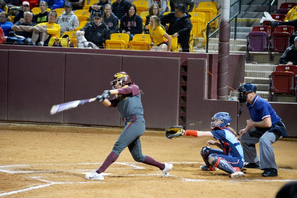 ASU senior Bethany Kemp hits a home run against Ole Miss, Friday, Feb. 6, 2015 at Farrington Stadium in Tempe. The Sun Devils won against the Rebels 6-3. (Krista Tillman/ The State Press).