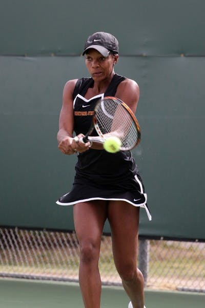 Sianna Simmons returns a volley in the ASU Thunderbird Invitational on Nov. 4, 2011. Simmons, who is out with a torn ACL, will miss the remainder of the season. (Photo by Beth Easterbrook)