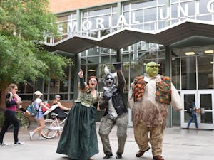 Cast members of upcoming Shrek the Musical pose for a photo on ASU's Tempe campus.