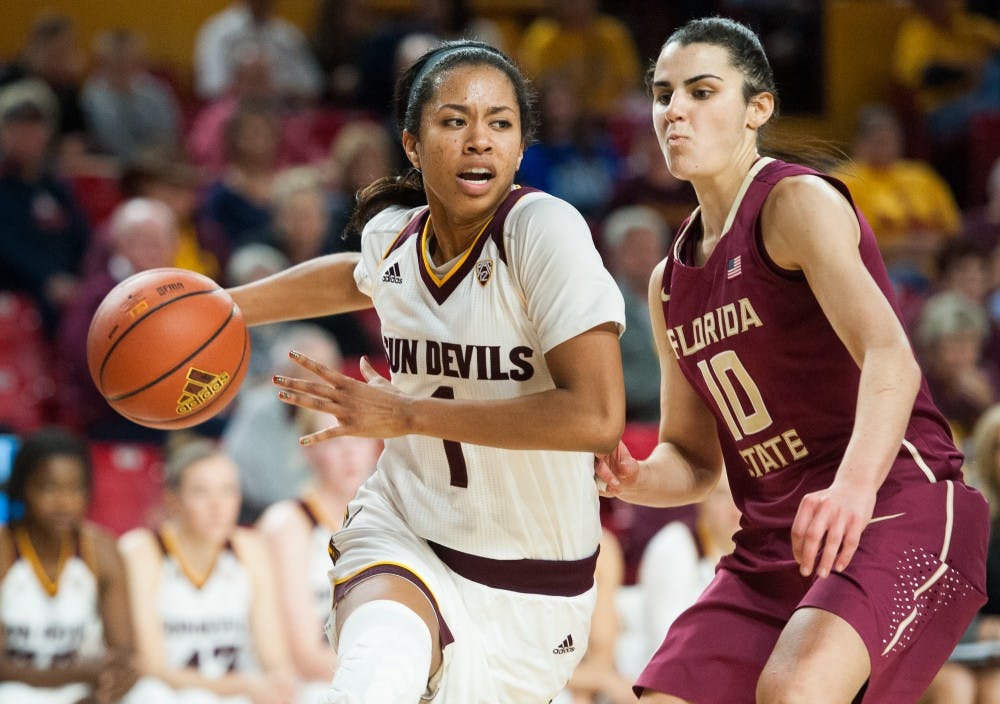 Senior guard Arnecia Hawkins (1) drives to the basket against Florida State on Monday, Dec. 21, 2015, at Wells Fargo Arena in Tempe. The Sun Devils defeated the Seminoles 68-56.