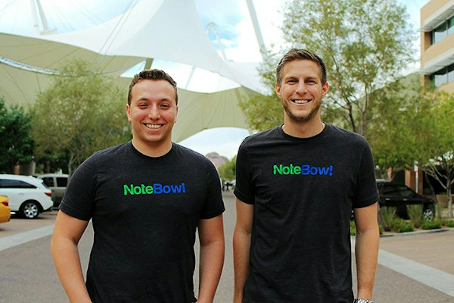 (Left) NoteBowl CEO and founder Andrew Chaifetz and Marketing Director Logan Stoneman pose outside their office at ASU SkySong in Scottsdale. NoteBowl is a Tucson based startup that provides universities with simple learning management system to connect students, professors and the campus community. (Photo by Shiva Balasubramanian)