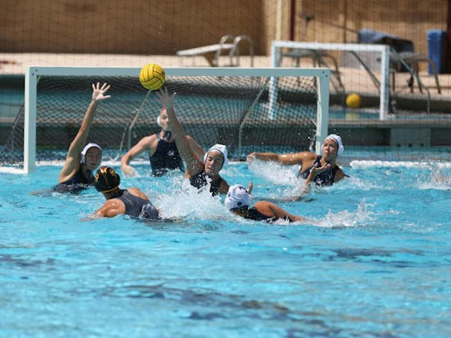 A California player blocks a shot by freshman attacker Izabella Chiappani at a home game on April 12. (Photo by Arianna Grainey)