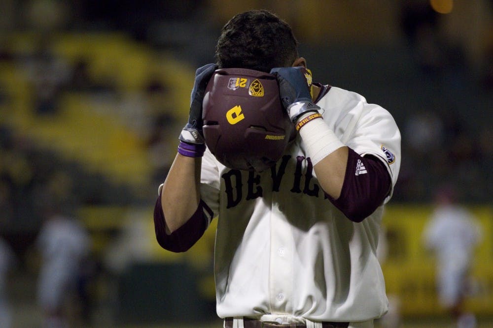 Sun Devil freshman infielder Carter Aldrete yells into his helmet after lining out against Loyola Marymount at Phoenix Municipal Stadium in Phoenix, Ariz. on March 3, 2017.