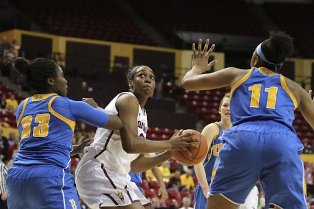 Senior forward Janae Fulceher takes on a double team in order to score some points in the paint against UCLA on March 1. Fulcher had 11 points in the Sun Devils loss to the Bruins. (Photo by Samuel Rosenbaum)