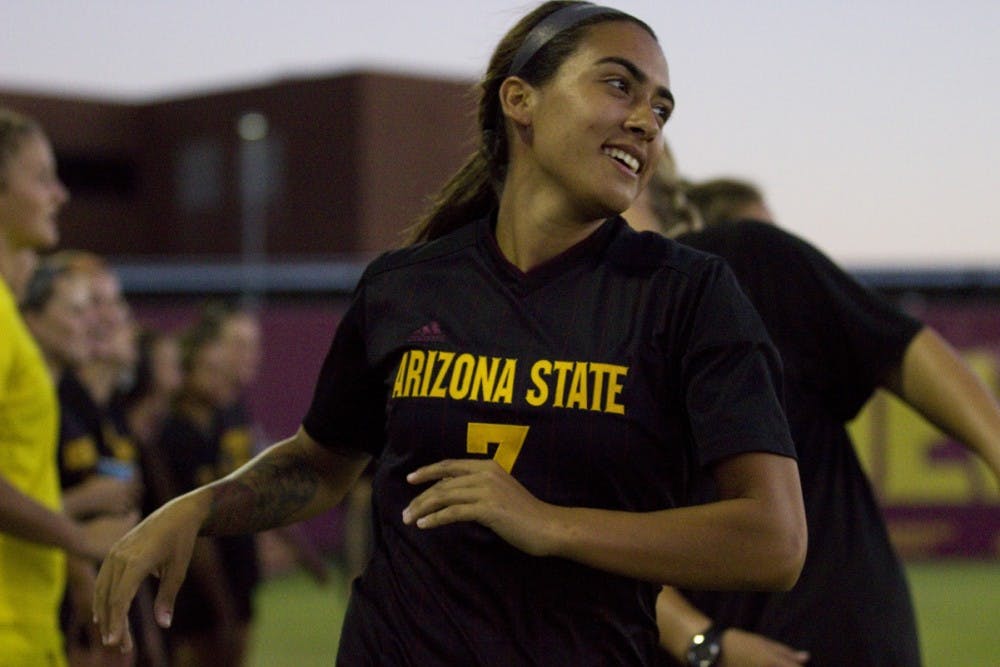 Arizona State redshirt senior midfielder Lucy Lara runs through a tunnel composed of her teammates during player introductions before the 1-3 loss versus Denver University in Sun Devil Soccer Stadium in Tempe, Arizona on Sunday, September 4, 2016.