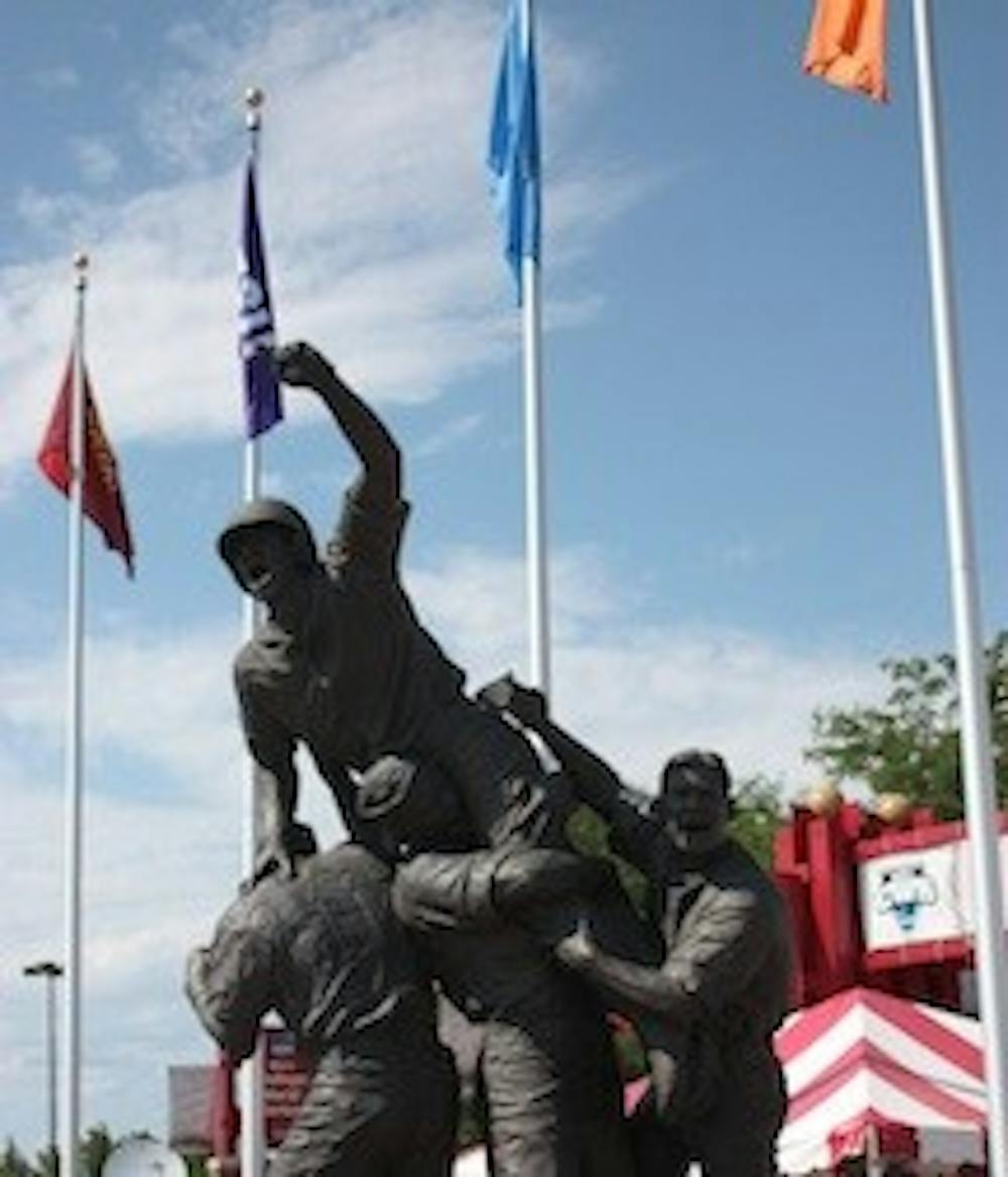 This statue sits outside the entrance to Rosenblatt Stadium, which is hosting its 61st and final College World Series. (Photo by Nick Kosmider)