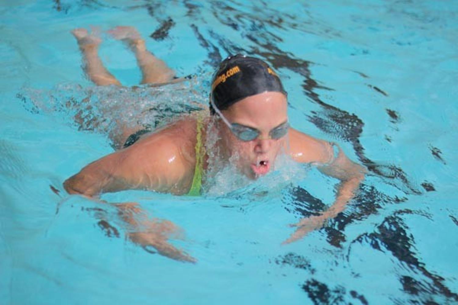 POOL PROWESS: Freshman swimmer Tristin Baxter works out in the pool during a practice earlier this season. Baxter and the ASU women's swim team topped Kansas and UNLV in Tucson over the weekend to open the season. (Photo by Andy Jeffreys)
