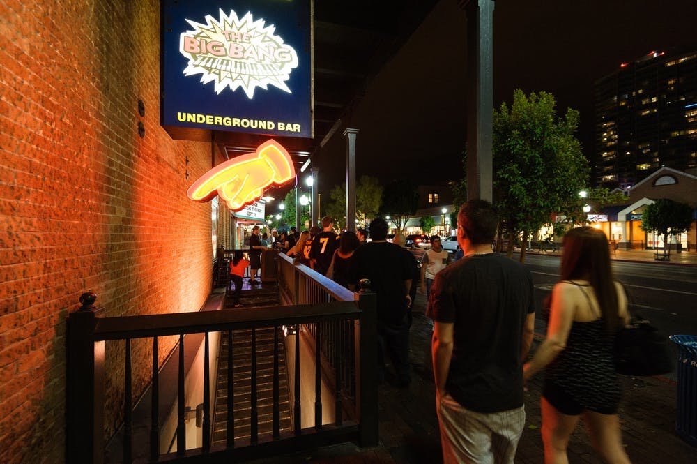 Patrons line up to enter the Big Bang Piano Bar on Mill Avenue in Tempe on Sept. 6th, 2014. The bar closed permanently after that night.