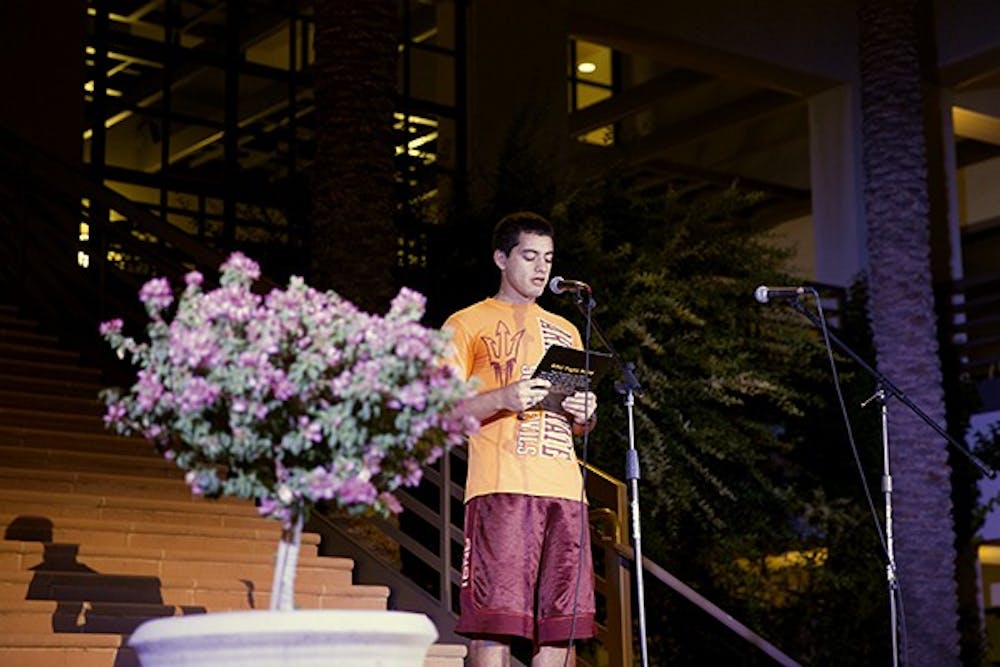 Samuel Peoples, a West campus student, performed some of his self-written poems during Open Mic Night at ASU West campus on Friday, Sept. 12. (Photo by Carly Traxler)