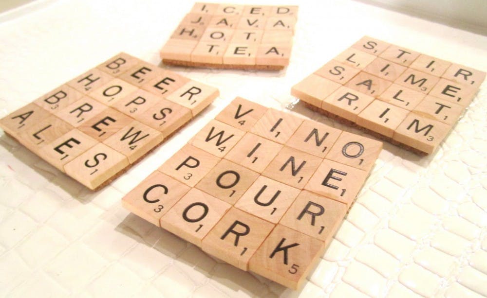 A Scrabble-tile coaster is the perfect asset to great home décor.  Photo taken by Domestic For Dummies. 