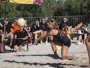 Jourdan Parnell digs a ball out during Wednesday's match vs. UofA at the PERA club in Tempe. 20 April 2016
