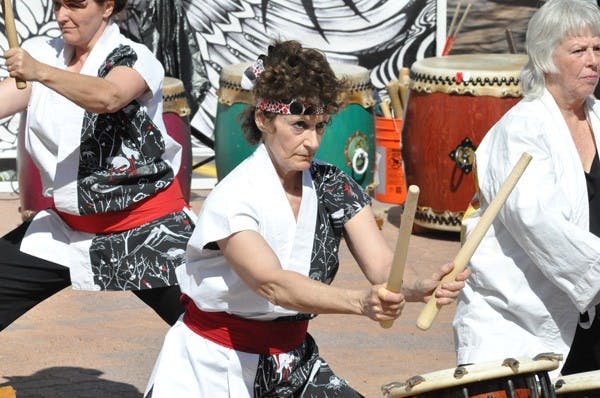 SIERRA SMITH | THE STATE PRESS MUSIC OF MATSURI: Fushicho Daiko of Phoenix, a group that plays traditional Japanese music using both ancient and modern instrumentation, performs at the Arizona Matsuri on Sunday.  