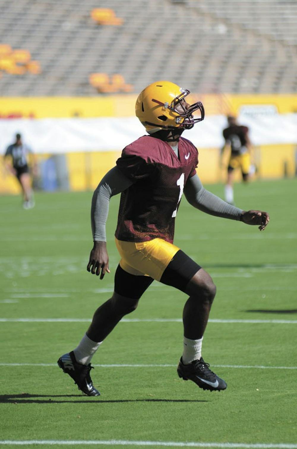 Junior running back Marion Grice tracks after a ball during the Sun Devils’ practice Tuesday at Sun Devil Stadium. (Photo by Aaron Lavinsky)
