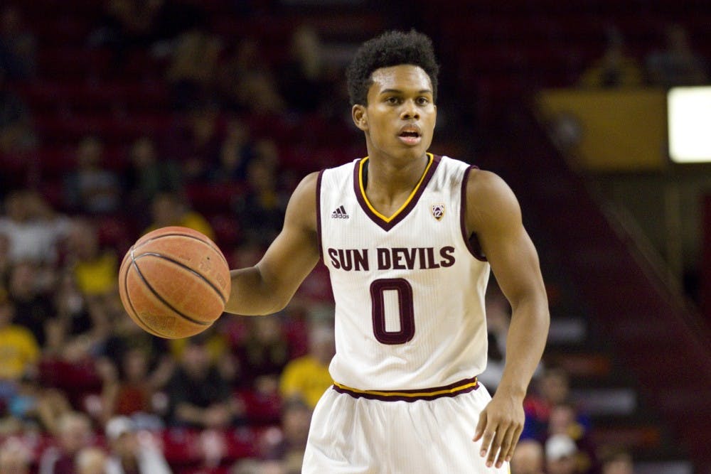 ASU junior guard Tra Holder (0) runs the offense during the first half of a game versus the Cal Poly Mustangs in Wells Fargo Arena in Tempe, Arizona on Sunday, Nov. 13, 2016.