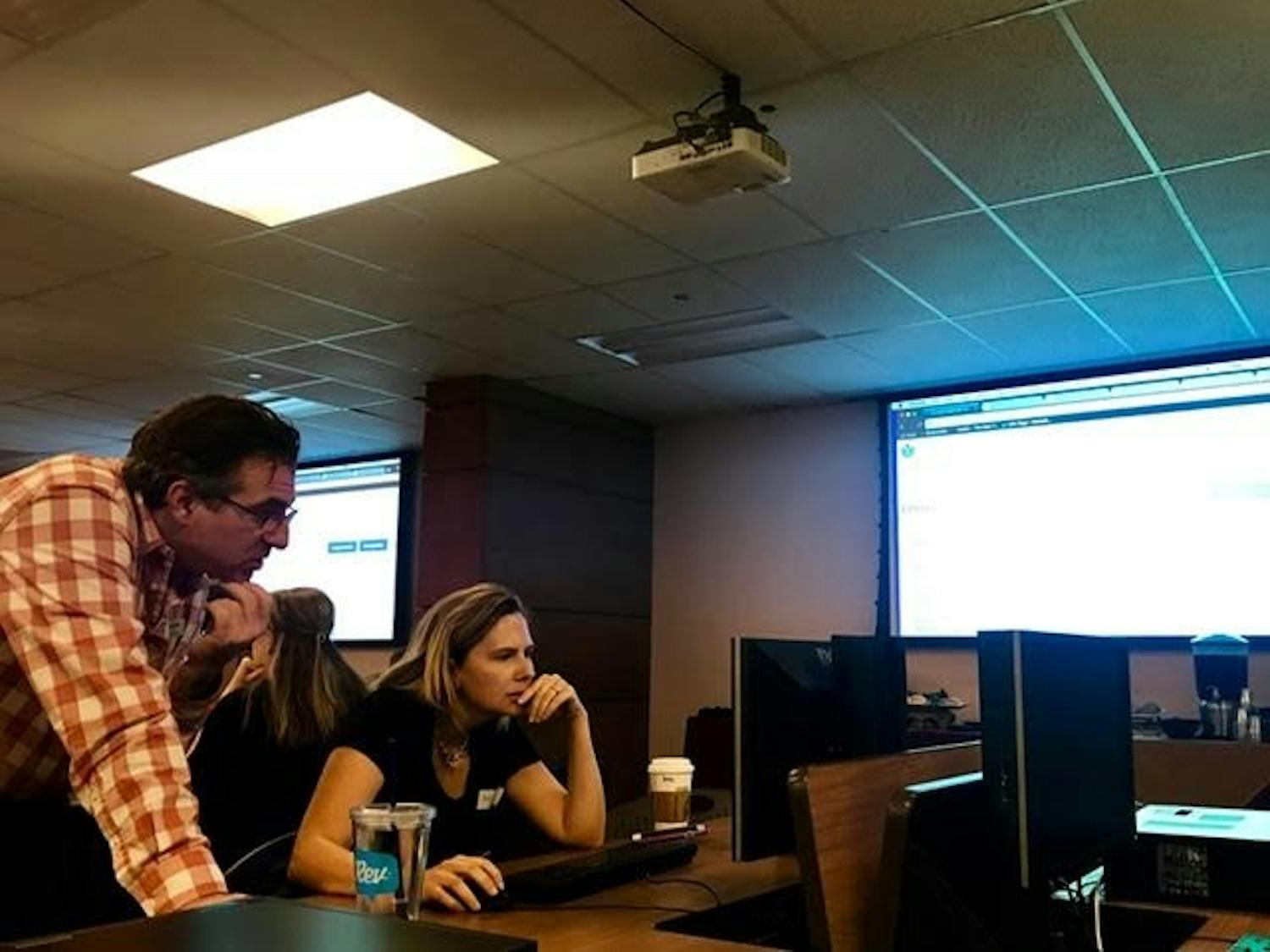 Mimmo Bonanni helps an editor during the Wikipedia edit-a-thon at Hayden Library on ASU's Tempe campus on Friday, March 31, 2017.