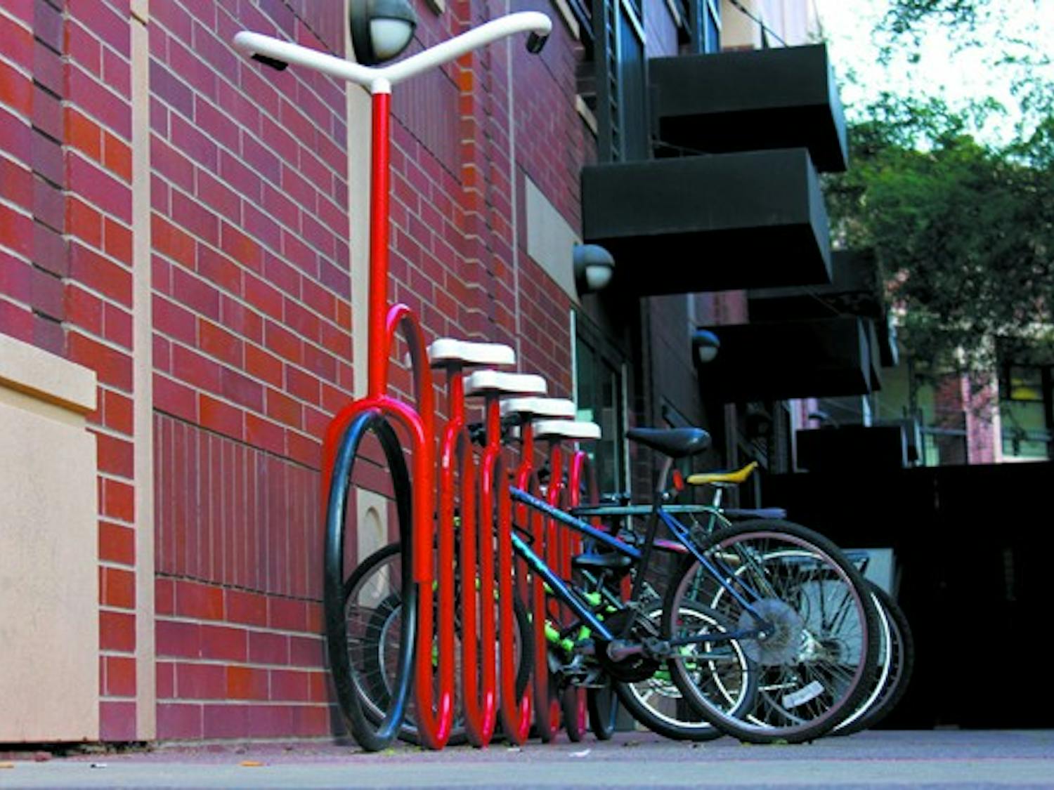LOCK IT UP: A unique bike rack allows visitors to Tempe's Mill Avenue to park their bikes and enjoy the sights. (Photo by Sam Rosenbaum)