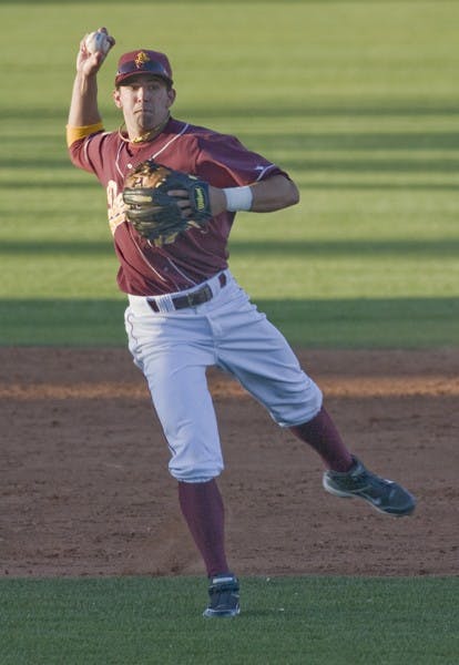 Stacked: ASU sophomore Deven Marrero makes a throw in the infield during a game last season. Despite losing several players to the majors during the offseason, the Sun Devils still have a loaded squad. (Photo by Scott Stuk)