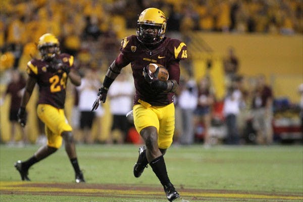 Junior safety Alden Darby returns an interception in ASU’s 63-6 victory over NAU on Aug. 30. (Photo by Sam Rosenbaum)