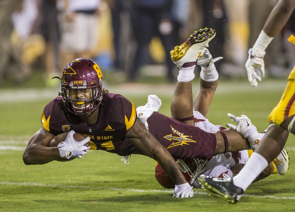 Redshirt senior wide receiver Gary Chambers (81) dives toward the end zone during a contest against USC on Saturday, Sept. 26, 2015, at Sun Devil Stadium in Tempe. The ASU football squad lost to the visiting USC Trojans 42-14.