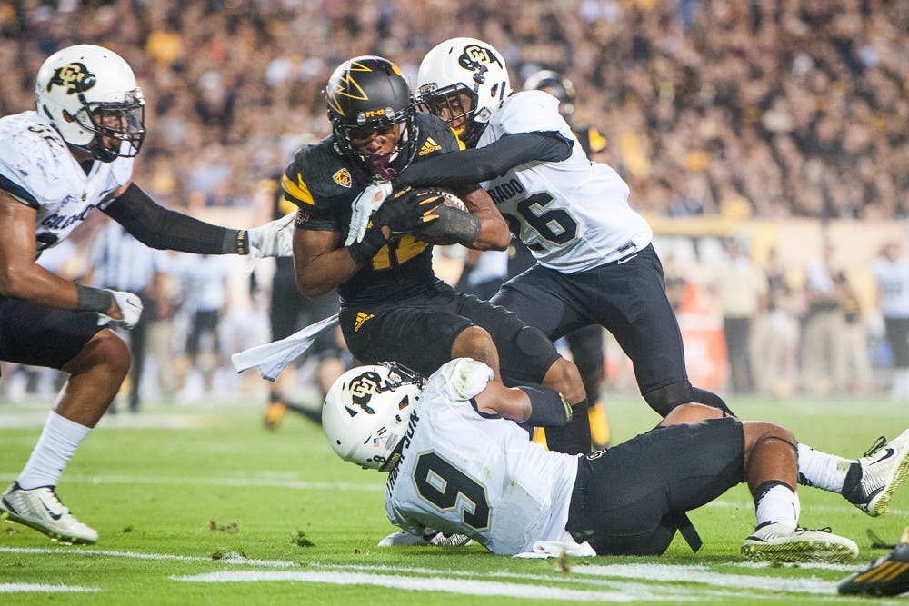 Redshirt junior wide receiver Tim White (12) rushes with the ball against Colorado on Saturday, Oct. 10, 2015, at Sun Devil Stadium in Tempe.