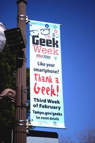 Mill Avenue is decorated with multiple banners announcing Tempe's Geek Week. Geek Week will feature multiple booths, activities and contests for all ages along Mill Ave February 15-24. (Photo by Ashley Kesweder)