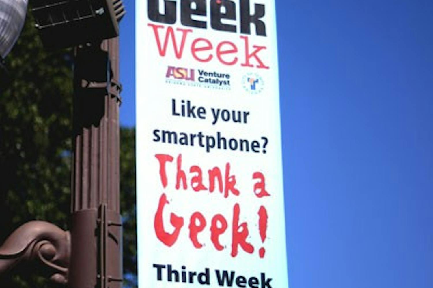 Mill Avenue is decorated with multiple banners announcing Tempe's Geek Week. Geek Week will feature multiple booths, activities and contests for all ages along Mill Ave February 15-24. (Photo by Ashley Kesweder)