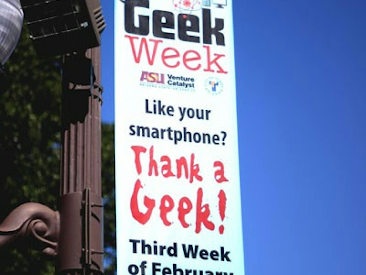 Mill Avenue is decorated with multiple banners announcing Tempe's Geek Week. Geek Week will feature multiple booths, activities and contests for all ages along Mill Ave February 15-24. (Photo by Ashley Kesweder)