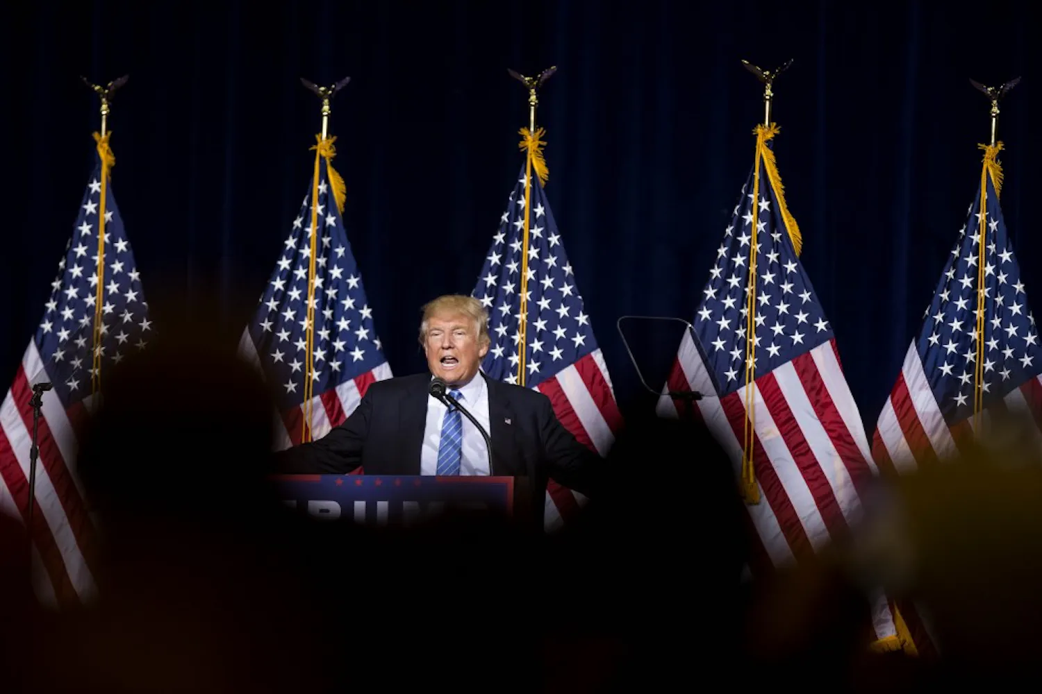 Donald Trump speaks during his campaign stop at the Phoenix Convention Center in Phoenix, Arizona, on Wednesday, Aug. 31, 2016.
