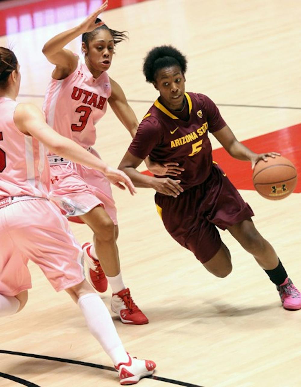 Deja Mann drives around a defender in a game against Utah on Feb. 9. Mann and the Sun Devils were swept on their southern California road trip. (Photo courtesy of Steve Rodriguez)