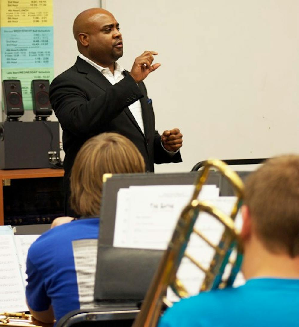 JAZZ IT UP: Trumpet player Terell Stanford offers his expertise to Dobson High School students during a Jazz Clinic on Wednesday night. (Photo by Lisa Bartoli)