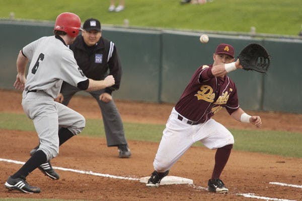 NOT IN TIME: ASU senior first baseman Kole Calhoun stretches to catch a pickoff attempt during a game earlier this year at Packard Stadium. The Sun Devils will open up the Coca-Cola Classic against Cal Poly on Thursday in Surprise. (Photo by Scott Stuk)