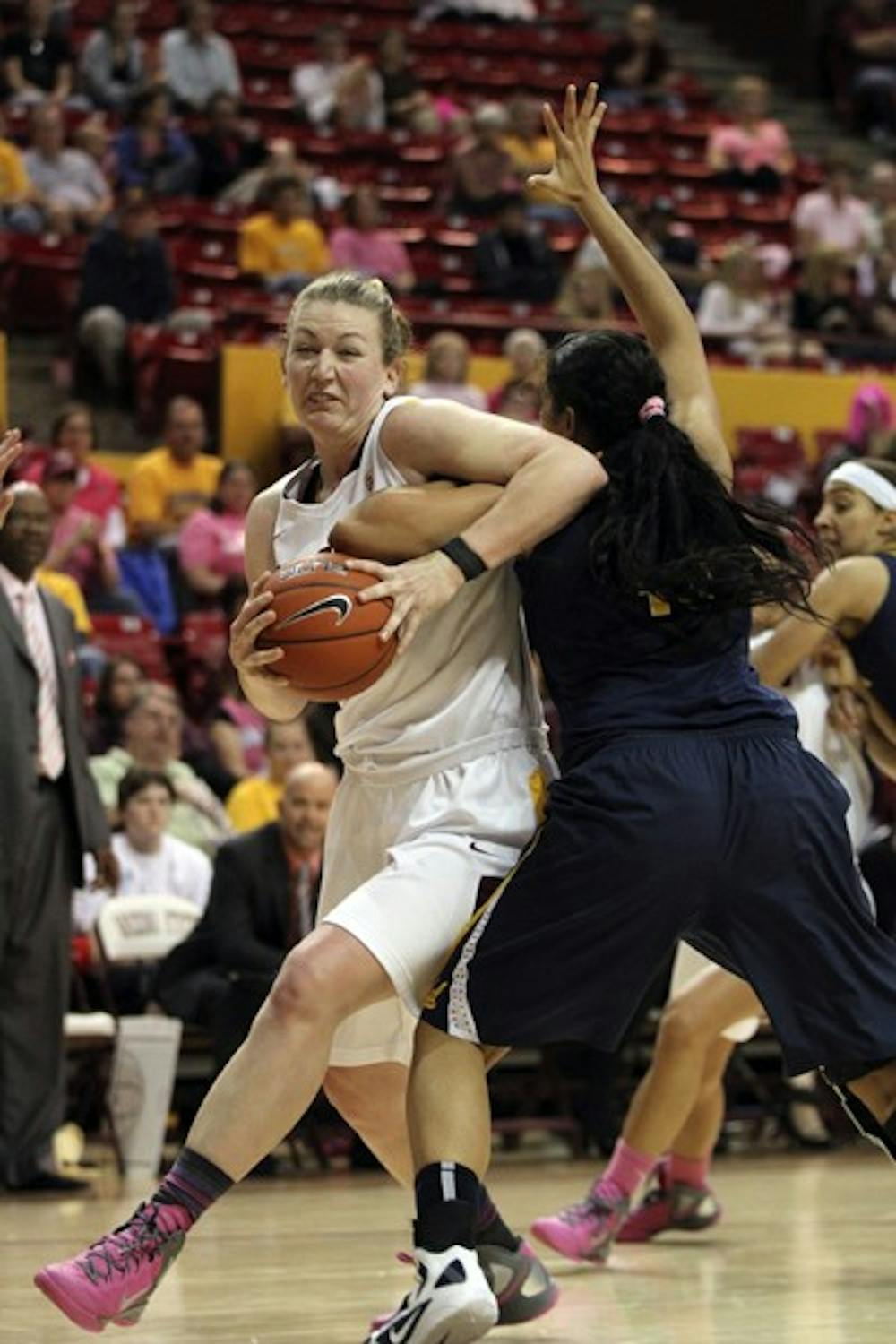 Important win: ASU sophomore guard Deja Mann defends on the outside against Oregon State redshirt sophomore guard Sage Indendi during the Sun Devils’ 59-54 victory on Saturday. ASU will carry the third seed into the Pac-10 tournament on Wednesday. (Photo courtesy of Steve Rodriguez)