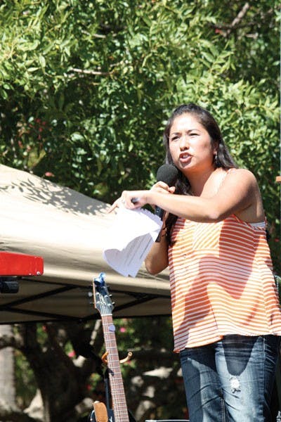 'When I drove to ASU, I had to worry I would be deported,' Dulce Matuz, an ASU graduate named one of TIME's most influential people of 2012, said on Hayden Lawn when she spoke about the recent DREAM Act Wednesday afternoon.  (Photo by Cameron Tattle)